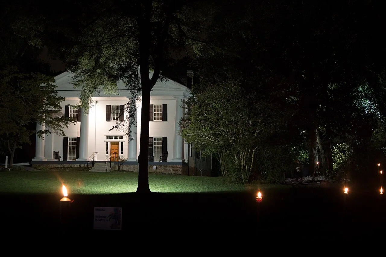 Bulloch Hall lit up at night, home of the Christkindlmarket in Roswell