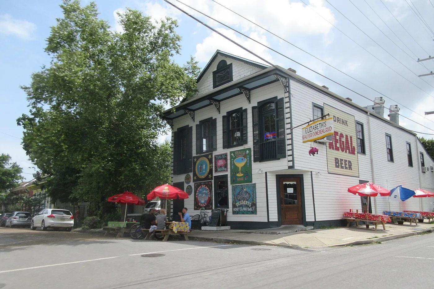 Diners at outdoor tables outside a restaurant in New Orleans. The photo was not taken in Roswell.