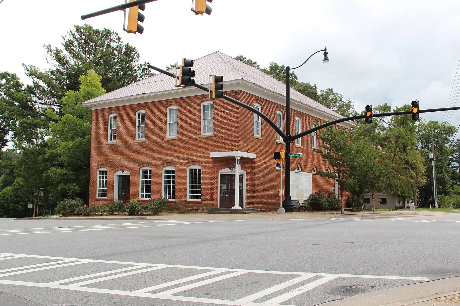 A building at the Crabapple crossroads in Milton, the area the school's profile says it sits near
